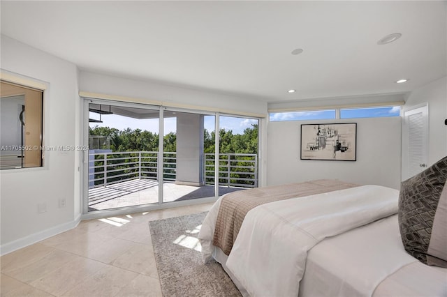 bedroom with access to exterior and light tile patterned flooring