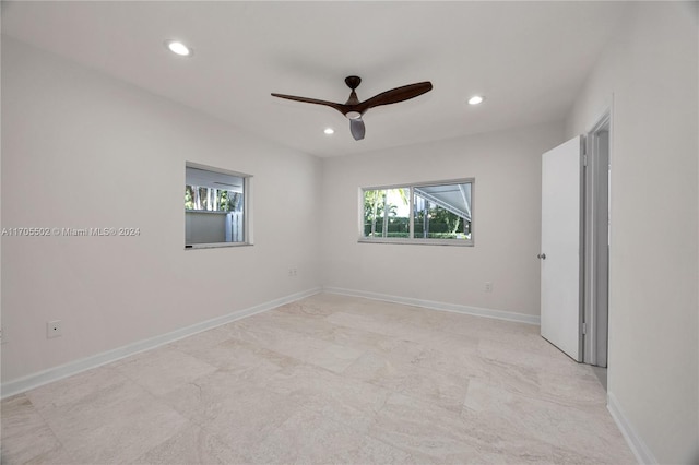 empty room featuring ceiling fan