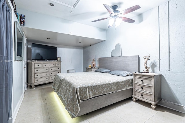 bedroom with light tile patterned floors and ceiling fan