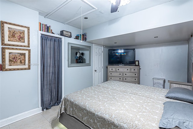 bedroom featuring light tile patterned floors and ceiling fan