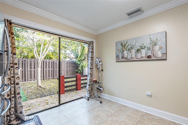 doorway to outside featuring crown molding and light tile patterned flooring