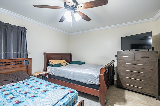 bedroom featuring ceiling fan and ornamental molding