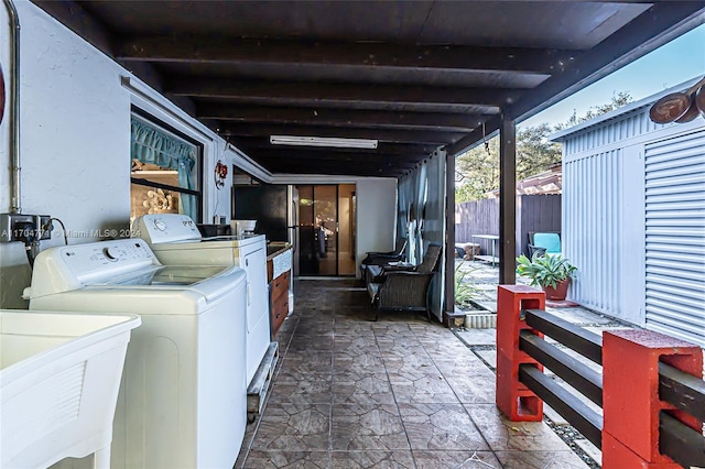 laundry room featuring separate washer and dryer and sink