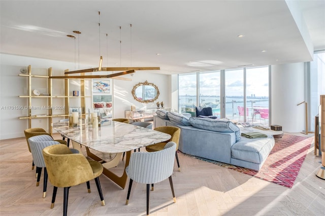 dining area featuring light parquet floors