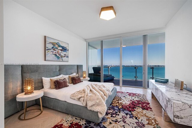 bedroom featuring light parquet floors