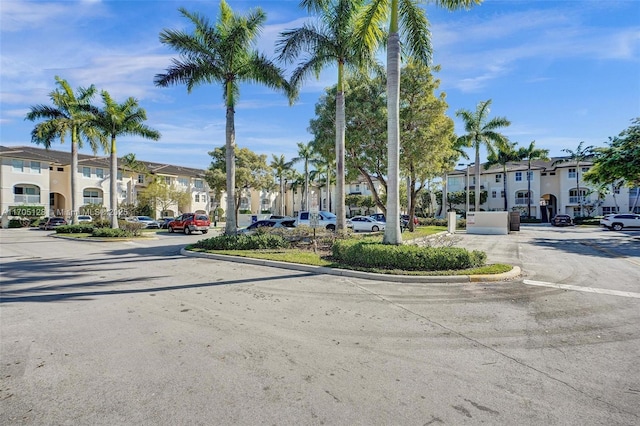 view of road with curbs and a residential view