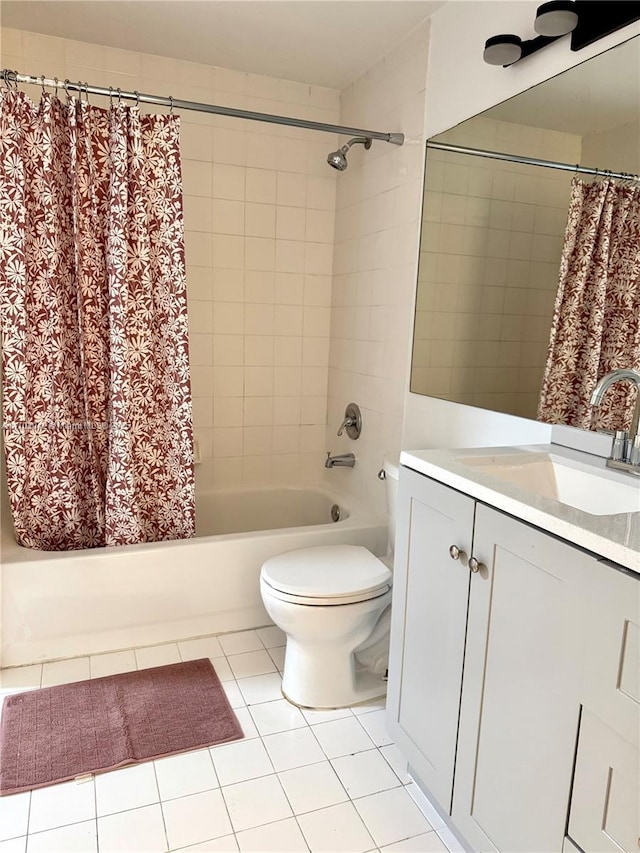 full bathroom with vanity, tile patterned floors, shower / bath combination with curtain, and toilet