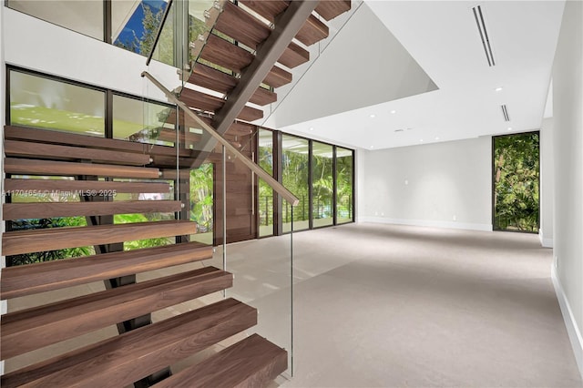 100 Hampton Ln, Key Biscayne, FL 33149 - stairway featuring baseboards, visible vents, and recessed lighting