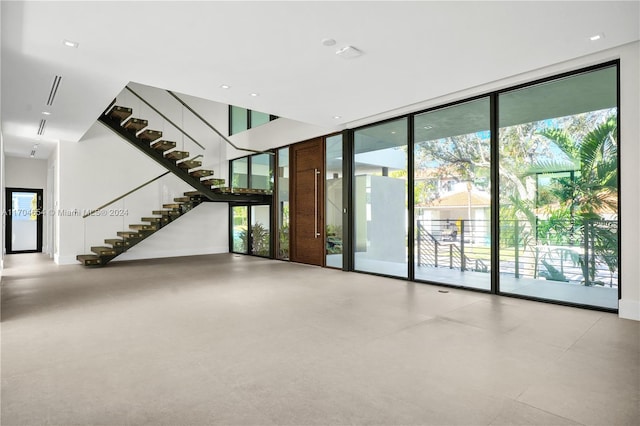 interior space with a wall of windows