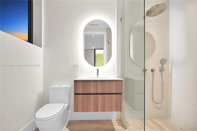 100 Hampton Ln, Key Biscayne, FL 33149 - bathroom featuring toilet, walk in shower, and vanity