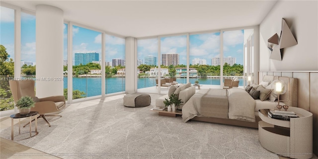 bedroom featuring floor to ceiling windows, a water view, and multiple windows