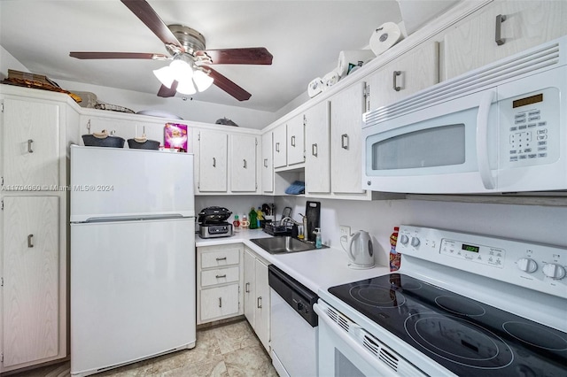 kitchen featuring white cabinets, white appliances, and sink