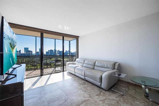 living room featuring a wall of windows