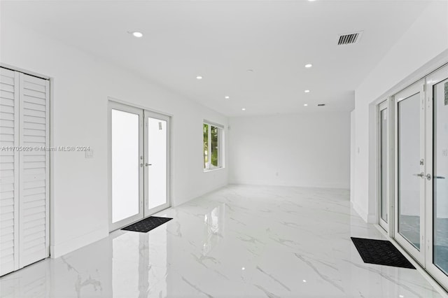 spare room with french doors