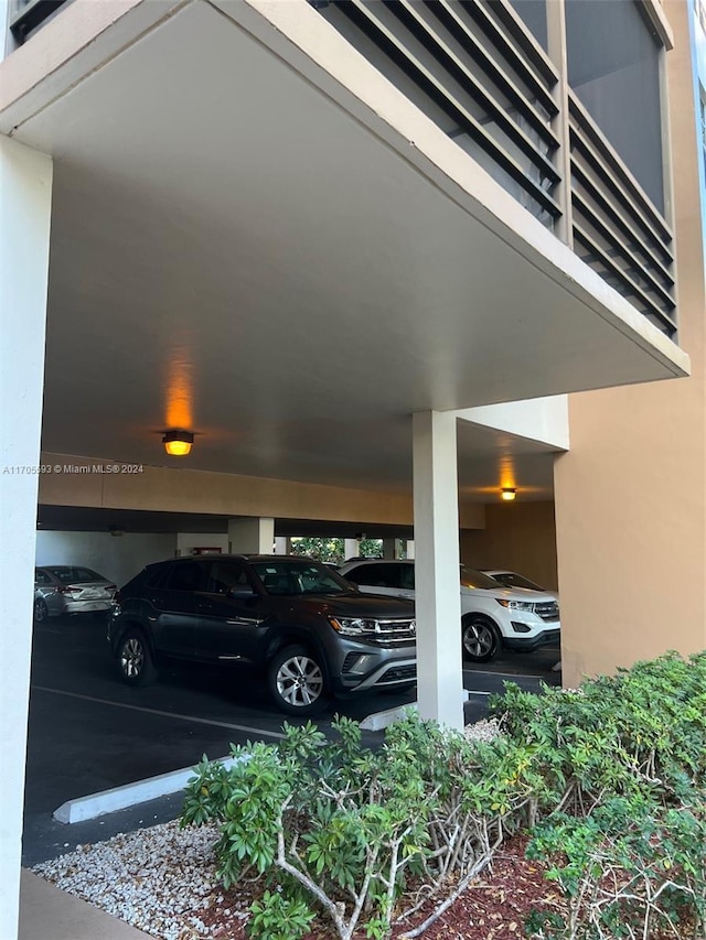 view of parking with a carport