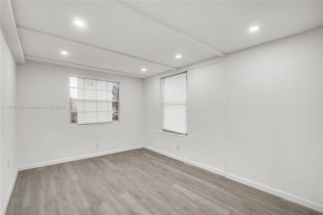 empty room featuring hardwood / wood-style floors