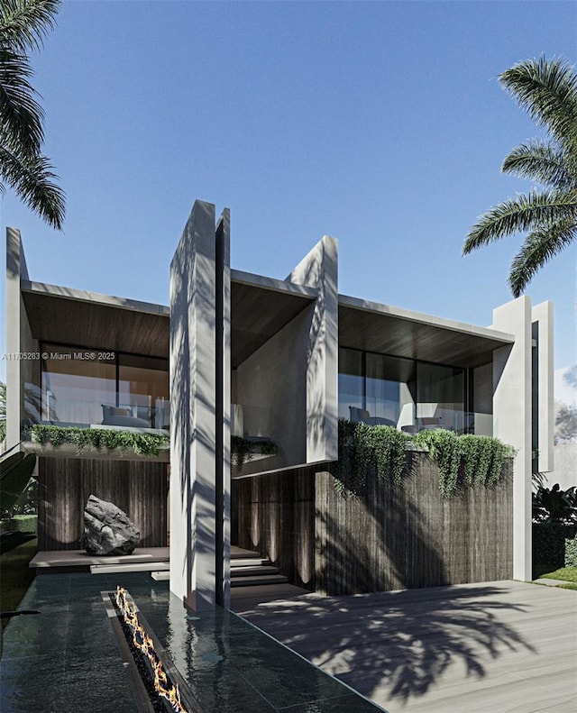 view of side of property with stucco siding