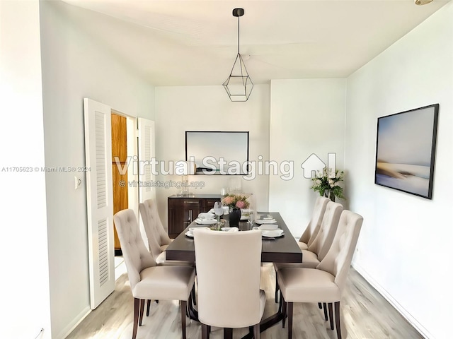 dining area featuring light wood-type flooring