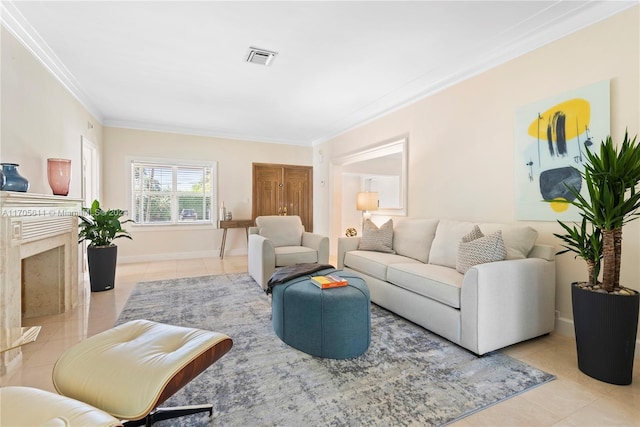 living room with a high end fireplace, ornamental molding, and light tile patterned floors