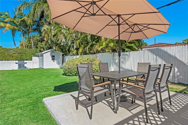 view of patio with a storage shed