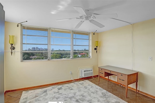 bedroom featuring a wall mounted air conditioner, ceiling fan, and dark parquet flooring