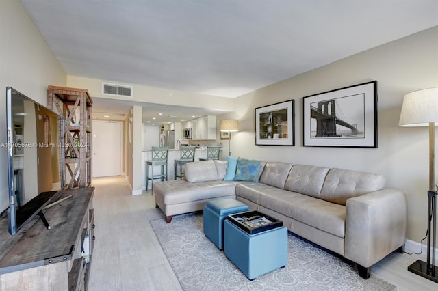 living room with hardwood / wood-style floors