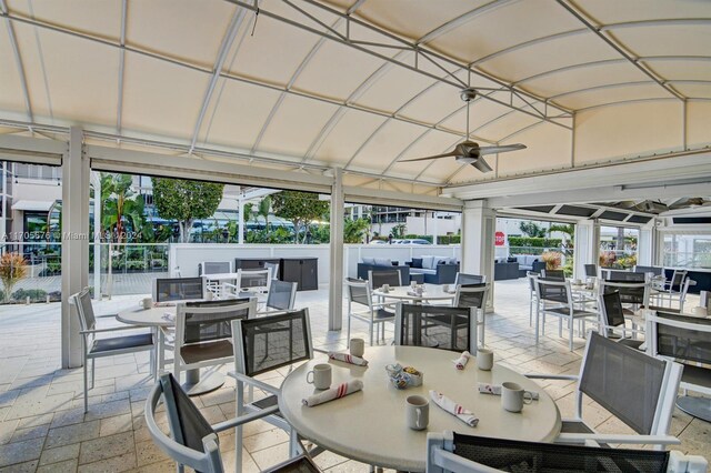2687 N Ocean Blvd Unit 402-G, Boca Raton, FL 33431 - view of patio / terrace with outdoor dining area, ceiling fan, and outdoor lounge area