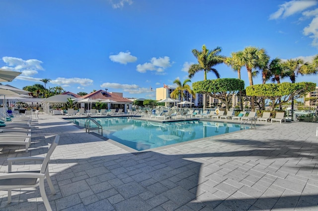 2687 N Ocean Blvd Unit 402-G, Boca Raton, FL 33431 - community pool featuring a patio area