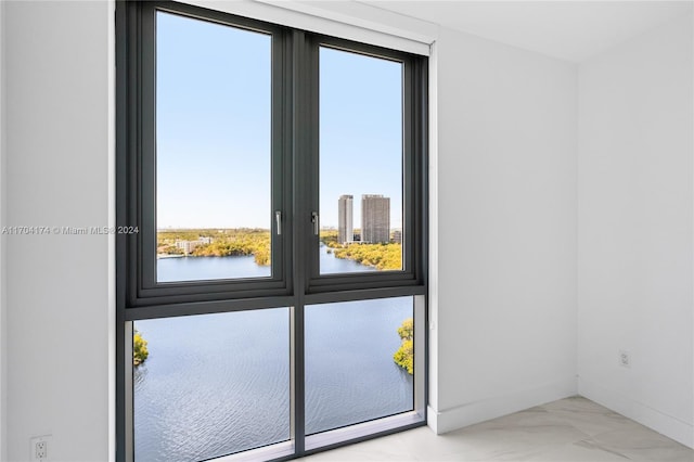 doorway featuring a water view