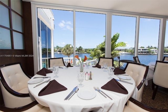 dining area with a water view