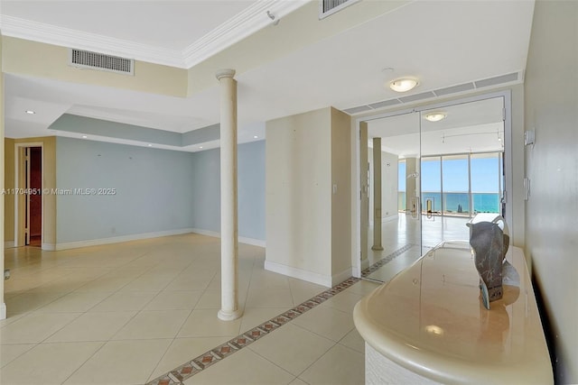 20281 E Country Club Dr Unit 2104, Aventura, FL 33180 - empty room featuring floor to ceiling windows, light tile patterned floors, baseboards, and a tray ceiling