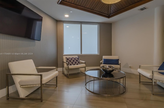 living area with wooden ceiling