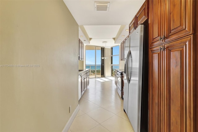 20281 E Country Club Dr Unit 2104, Aventura, FL 33180 - kitchen with appliances with stainless steel finishes, a sink, brown cabinets, backsplash, and recessed lighting