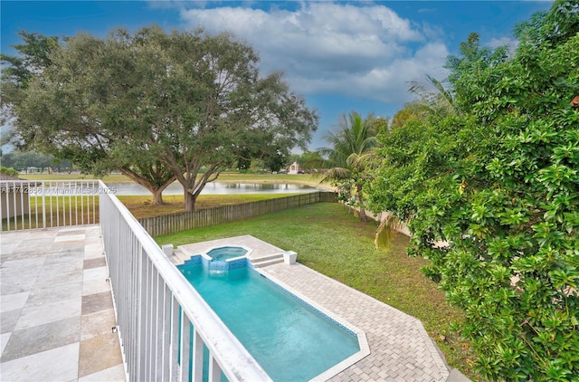 view of pool featuring a yard, a patio, a pool with connected hot tub, a water view, and a fenced backyard