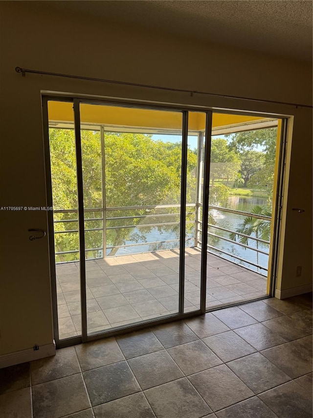 entryway featuring a water view