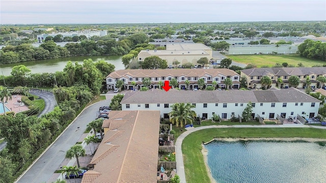 drone / aerial view featuring a water view