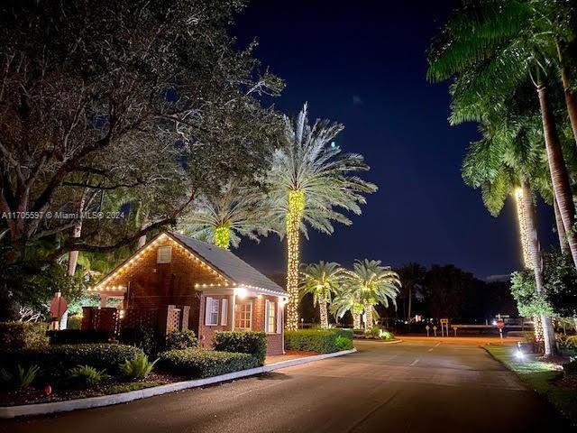 12040 N Eagle Trace Blvd N, Coral Springs, FL 33071 - view of asphalt street featuring curbs