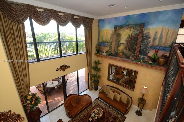 sitting room with ornamental molding