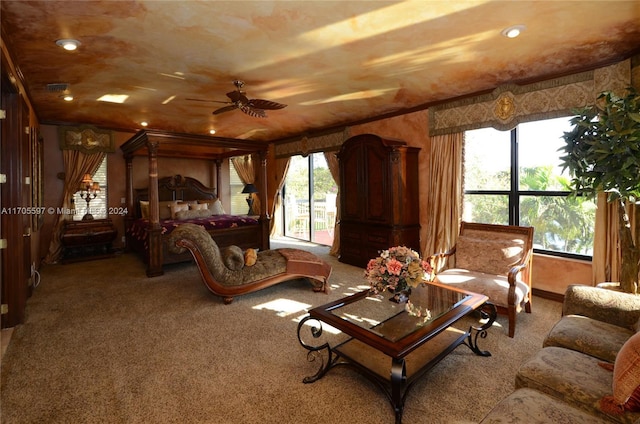 carpeted bedroom featuring multiple windows