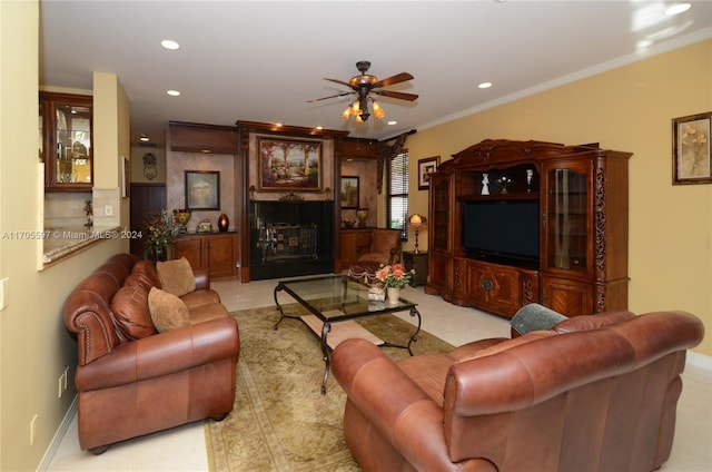 carpeted living room featuring ceiling fan and ornamental molding