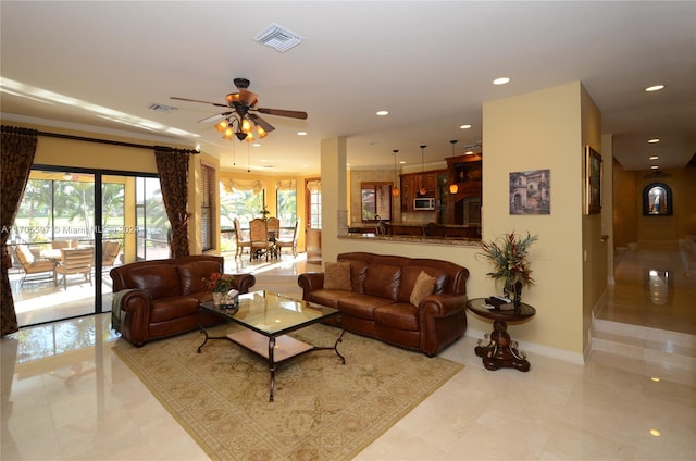 living room featuring ceiling fan