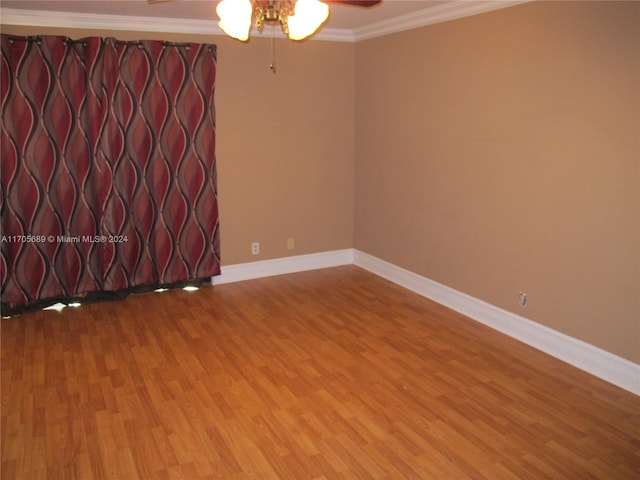 unfurnished room with ceiling fan, ornamental molding, and light hardwood / wood-style flooring