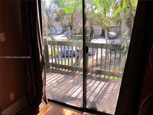 doorway to outside featuring hardwood / wood-style flooring