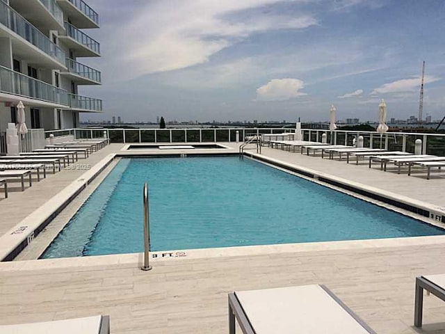 view of pool featuring a patio area