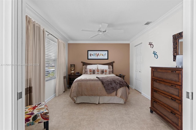 bedroom featuring ceiling fan, crown molding, and light tile patterned floors