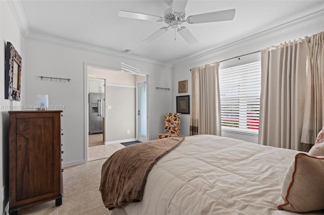 bedroom with ceiling fan, light tile patterned flooring, crown molding, and high end refrigerator