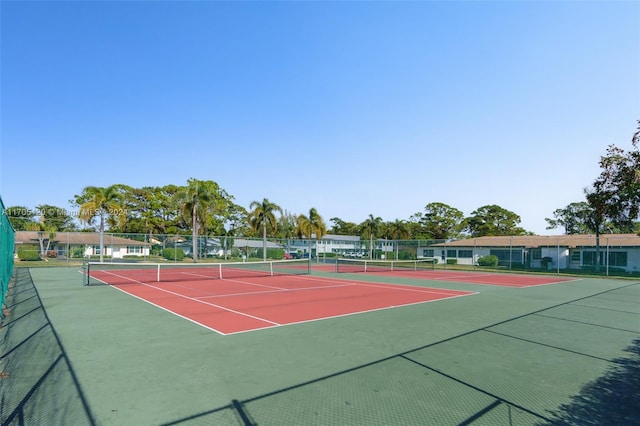 view of tennis court with basketball court