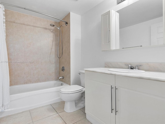 full bathroom featuring toilet, shower / bath combo, vanity, and tile patterned floors