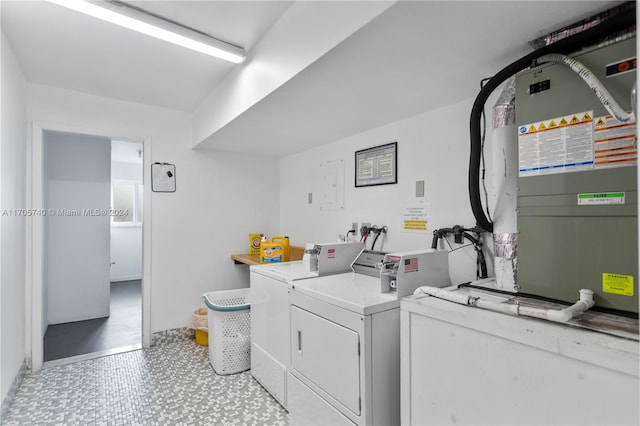 washroom with separate washer and dryer