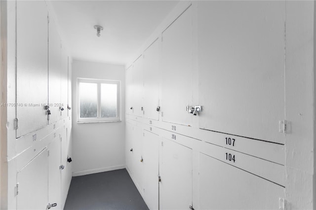 bathroom featuring concrete flooring